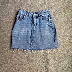 DISTRESSED DENIM SKIRT